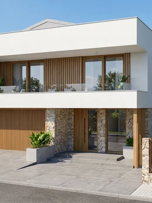 Front facade of Brisa villa with split-face stone cladding, a timber-slat garage door and entry screen, and a stone-walled garden entrance.