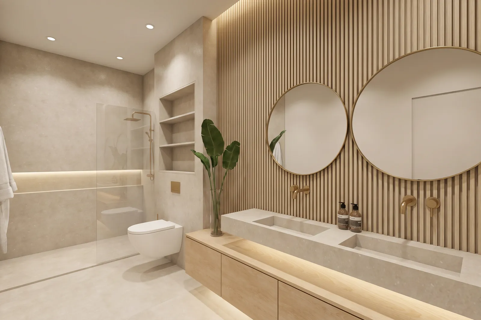 Baño en suite con una pared de lamas de madera, dos espejos redondos de gran formato con marco de latón, un tocador flotante de roble con dos lavabos y una ducha a ras de suelo.