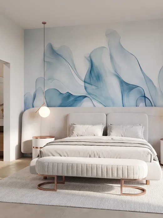 Bedroom with a wave-patterned blue wall mural, a curved upholstered headboard, and rose-gold pendant lighting on either side of the bed.
